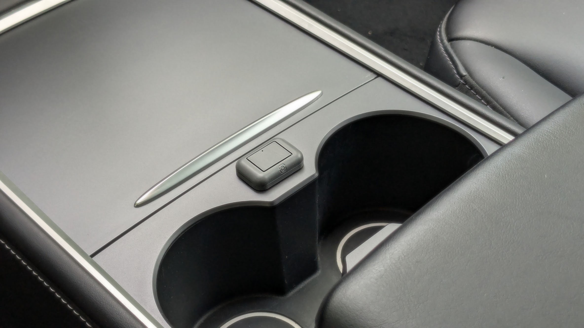 Button on Tesla Model 3 center console